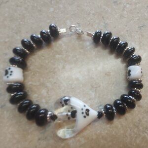 Handmade pawprint lampwork glass beaded bracelet with sterling clasp
